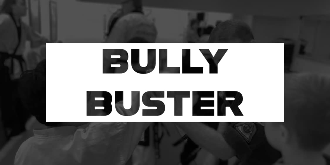 bully busters man helping stuident block strike american tang soo do knockout letters